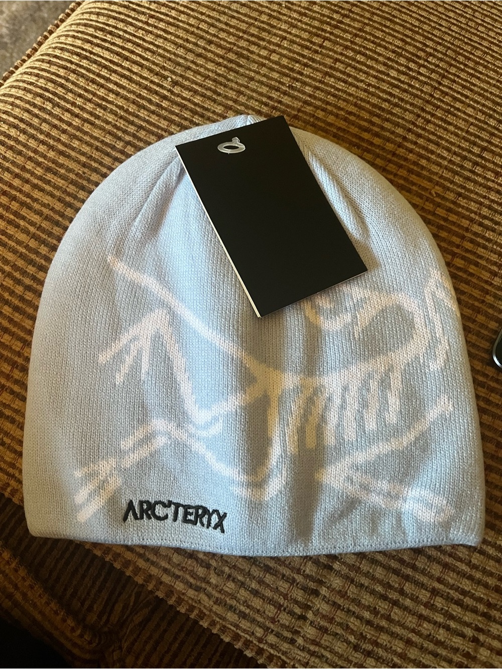 Arc'teryx Light Blue Beanie with White Graphic and Black Logo